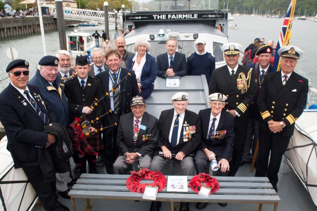  Exercise Tiger Veterans, American Irving Locker and British sailor Don Reynolds along with members of the Dartmouth Royal British Legion, former Commodores of the Britannia Royal Naval College Robin Shiffner CB DL and Jake Moores, along with Dartmouth Mayor Rob Lyon and Dart Harbour Board member Jan Scott, and the US Naval Attached Captain David Stracener onboard the Fairmile.